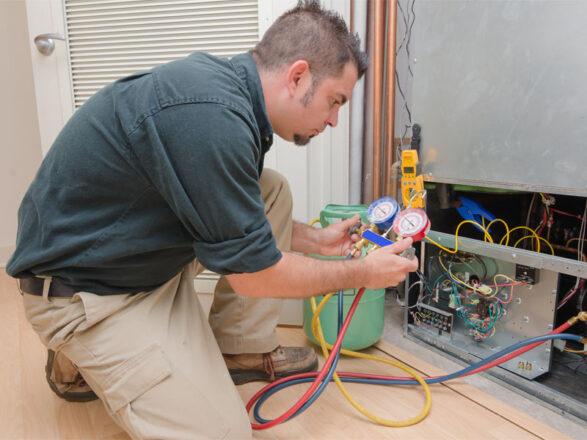 man performing a AC Installation in Lake Mary