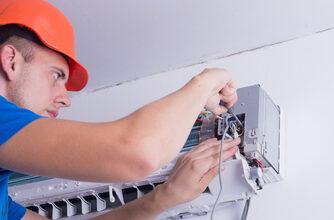 Man performing AC Service in Deland, Lake Mary, Orange City, Sanford, Debary, Deltona